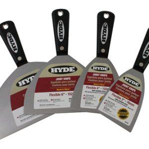 TradeMark Hyde joint knives with black handles and carbon steel ends on white background