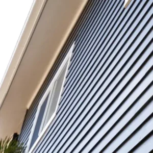 James Hardie fire insulation facade weatherboard home painted blue