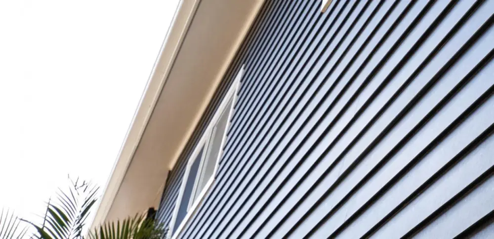 James Hardie fire insulation facade weatherboard home painted blue